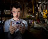 Clay Jensen (Dylan Minnette) discovers his dead girlfriend's tapes.